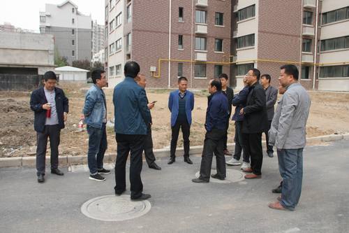 銅煤公司承建的銅煤2#小區(qū)水仙居5、6、7、8#樓順利通過竣工驗收