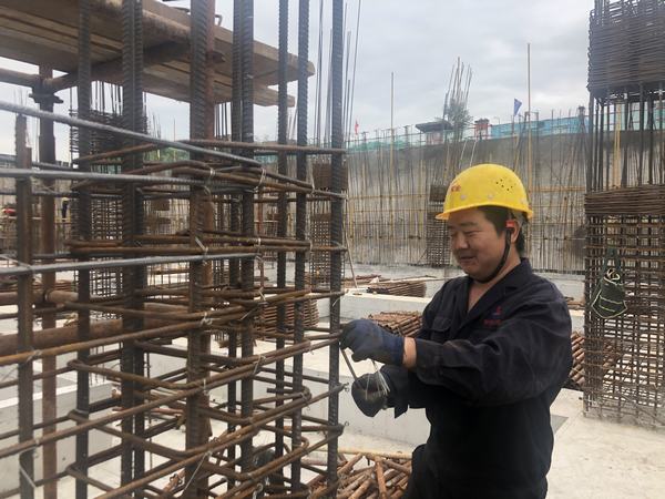 按下快門，定格建設(shè)施工一線最美身影