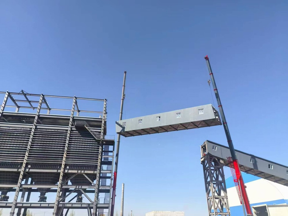 陜煤建設(shè)天工公司新疆第一項(xiàng)目部：雙機(jī)協(xié)作展絕技，棧橋凌空貫長虹